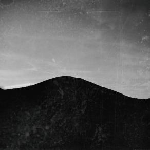 A sleeper day in front a sleeper hill 