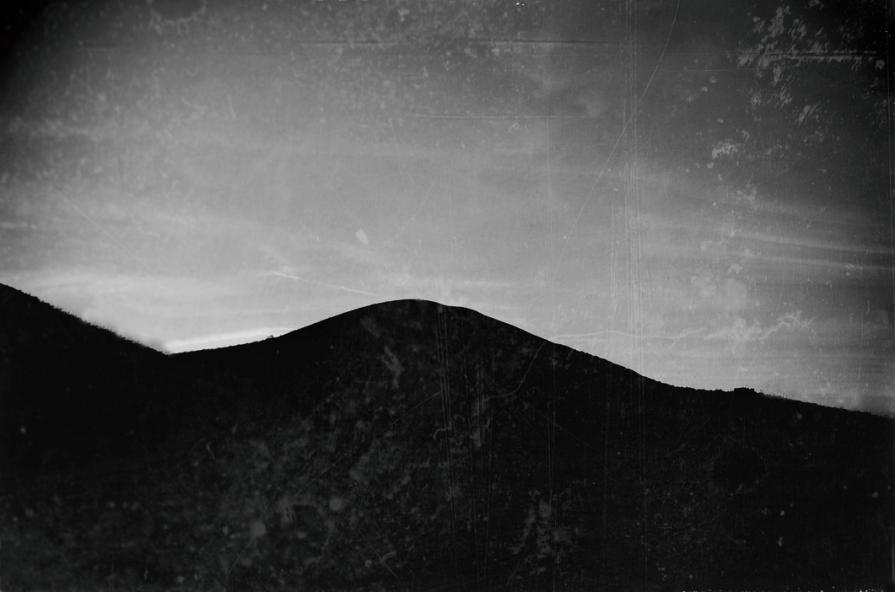 A sleeper day in front a sleeper hill 