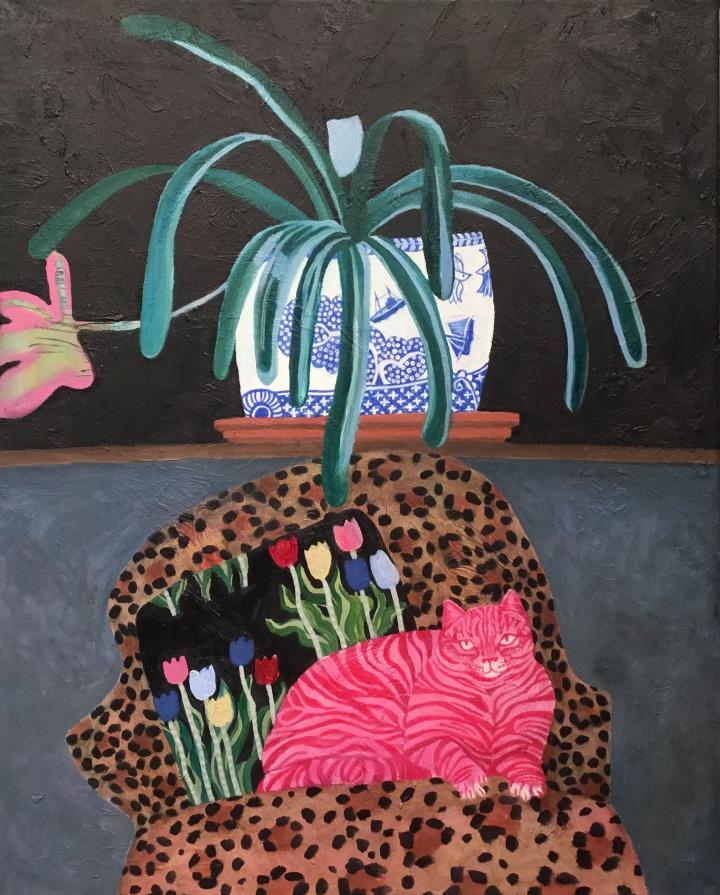 Pink tabby in an armchair