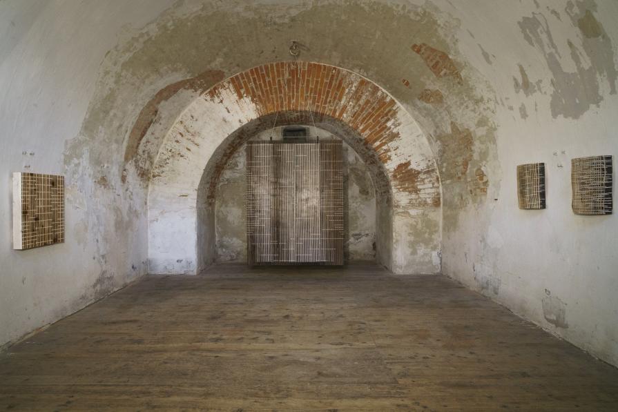 Line Reliefs_ 2017, burned & painted wood (in front: 220x169x12cm, left: 80x83,5x12.5cm, right both: 80x83,5x12.5cm)