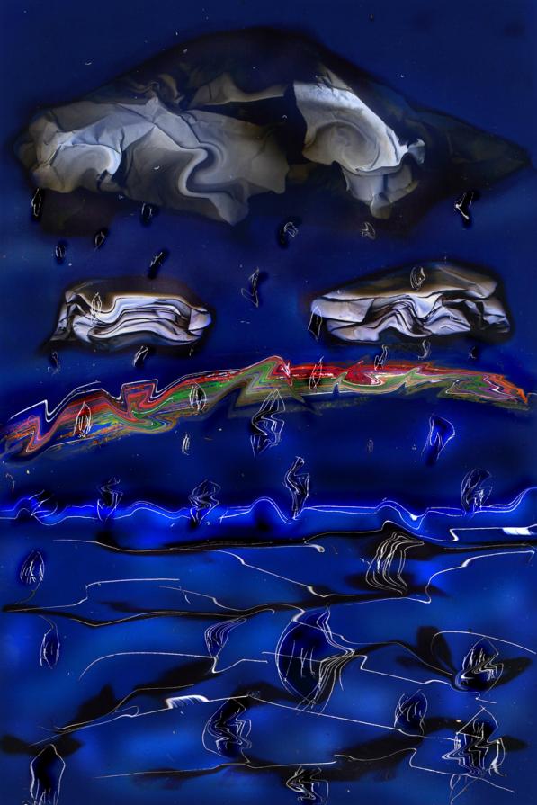 piove....un arcobaleno si mescola tra mare e cielo in un blue.