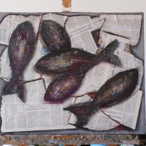 Pesci su giornale