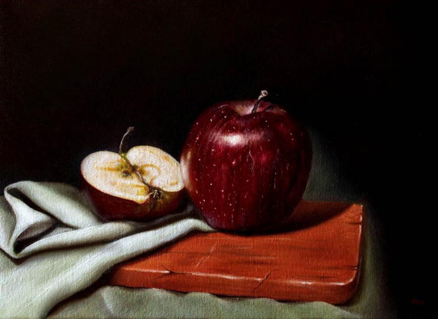 Natura morta con una mela e mezza