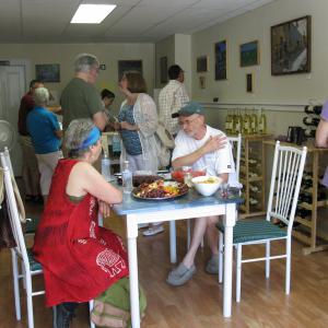 Carla Strozzieri's paintings are on exhibit at "From the Vineyards,"  Paintings by Carla Strozzieri