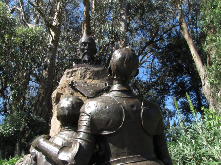 Don Chisciotte e Sancho Panza si inchinano a Cervantes