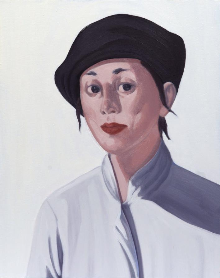 volto di donna con cappello scuro