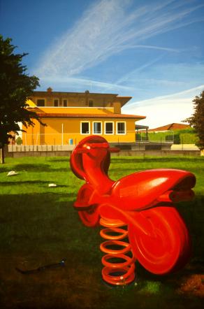 Paesaggio con giostrina rossa