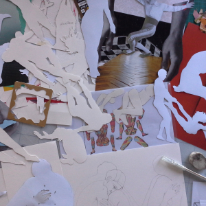 Studio table with paper dolls
