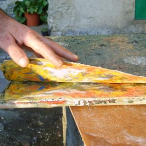 Teoria del metamorfismo cromatico. Fase di asporto, come da video,  della materia solidificata dal supporto