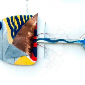 The downshifter Simone Perotti and Manuela Manes and their sculptures