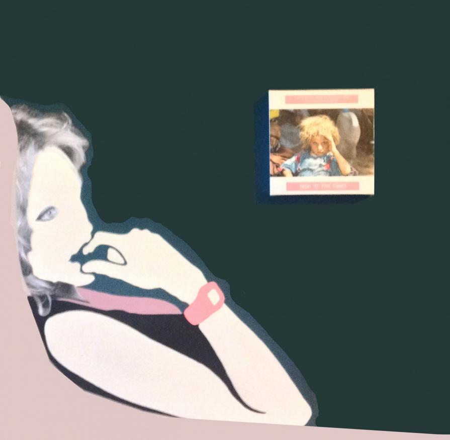 Signs 'o' The Times - A girl from minority Yazidi sect rest at the Iraqi-Syrian border