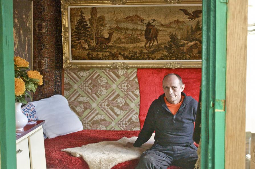 East-European economic refugee in his self-constructed house in Belgium
