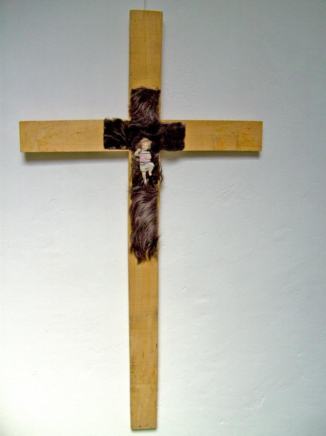 the return of little Jesus on a cross of human hair the return of little Jesus on a cross of human hair