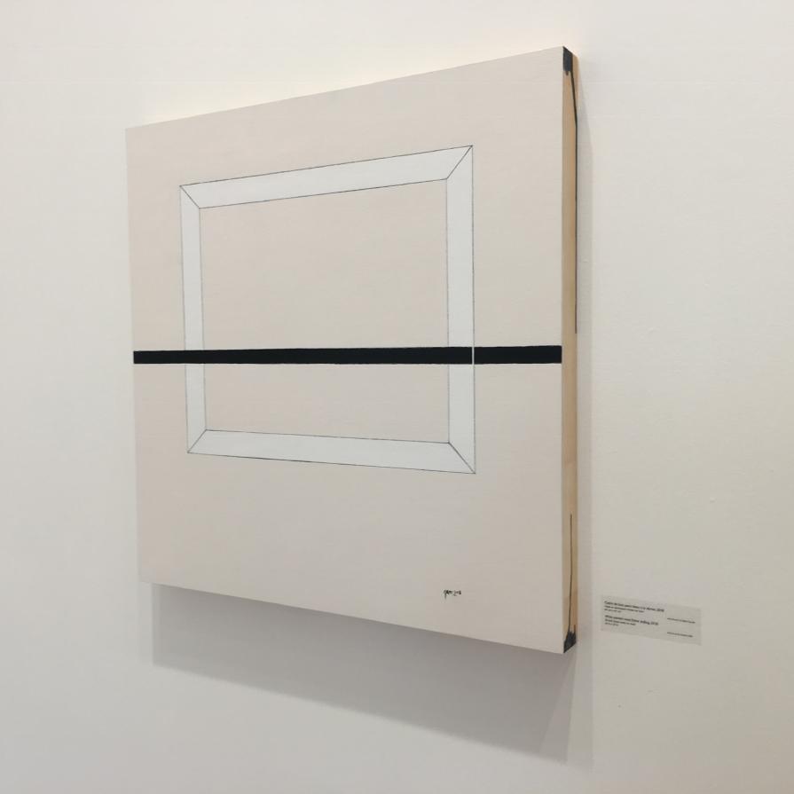 Cadre de bois peint blanc à la dérive