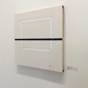 Cadre de bois peint blanc à la dérive