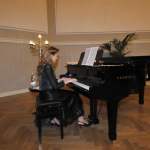 BETWEEN MUSIC AND POETRY