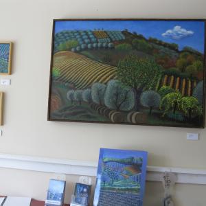 Carla Strozzieri's paintings are on exhibit at "From the Vineyards,"  Paintings by Carla Strozzieri