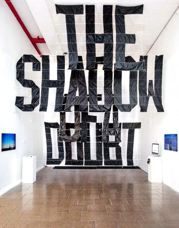 'The Shadow of a Doubt' from the project 'Severe Clear'; installation view of airplane banner